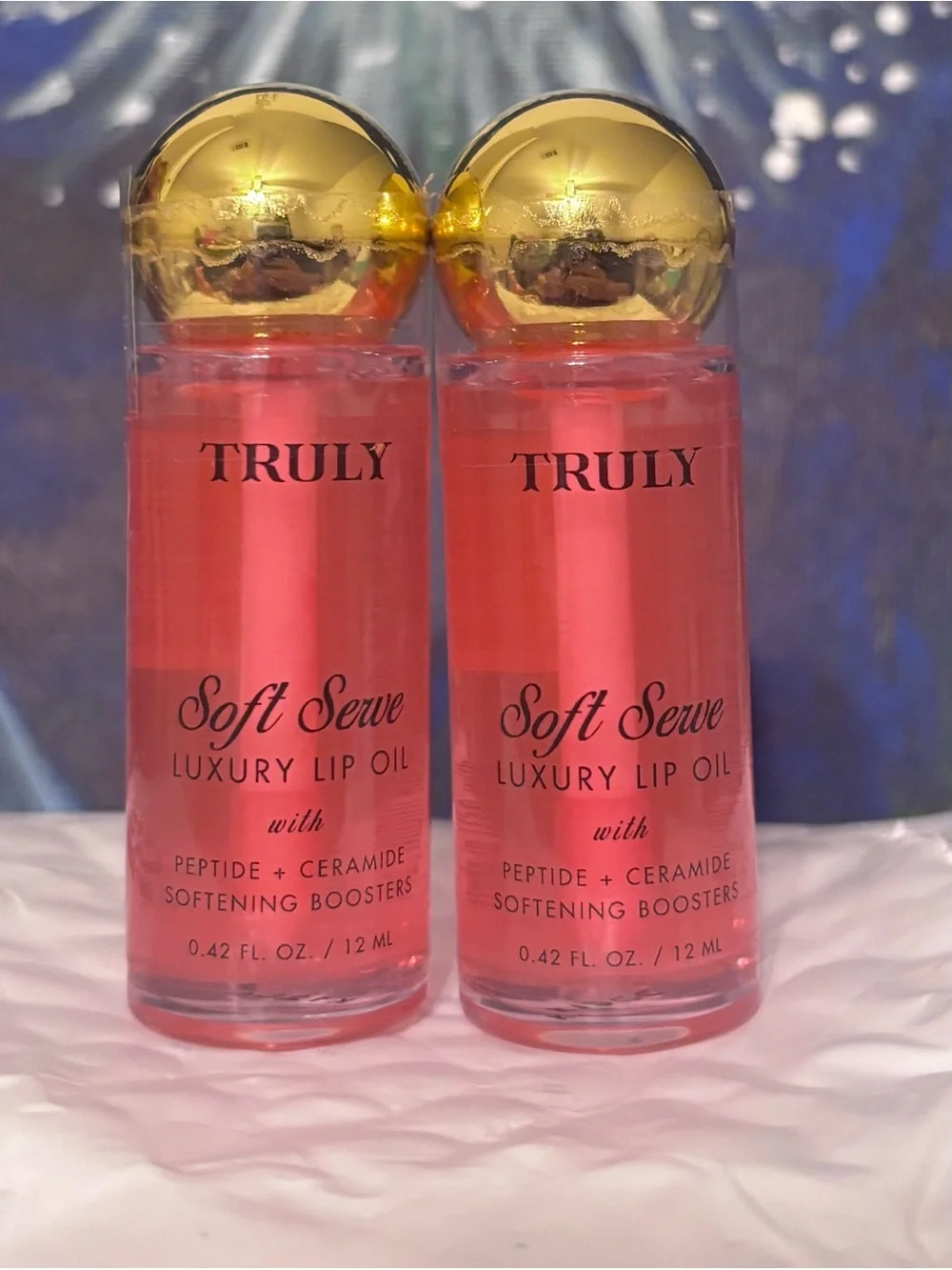 But one get one! TRULY Soft Serve Luxury Lip Oil — Coral Pink Duo with Gold Caps